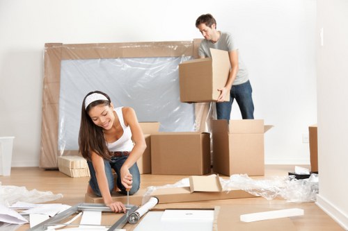 Professional house removals in Kingston with moving van and packed boxes