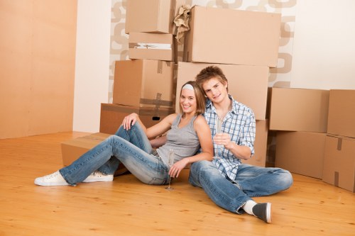 Professional house removalists in Kingston loading furniture carefully