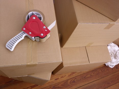 Professional removals team securing items safely for transport