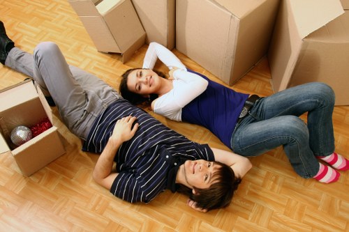 Moving truck and packed boxes for a Kingston home relocation