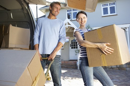 Packing boxes and preparing for house removals in Kingston
