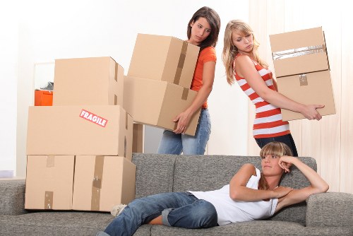 Professional crew handling bulky furniture removal in Kingston