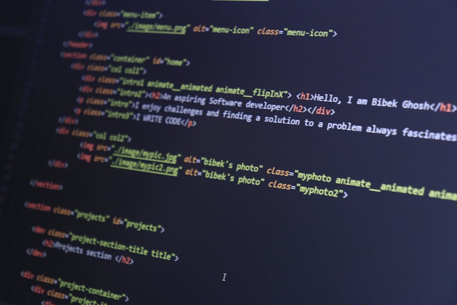 A computer screen displaying lines of HTML and CSS coding, with colorful tags and attributes visible in a dark background. The code includes headings, image source links, and class descriptions, indic