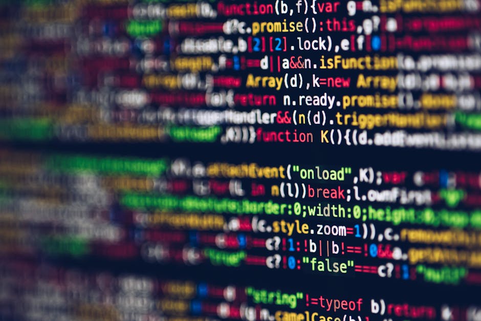 A computer screen displaying lines of HTML and CSS coding, with colorful tags and attributes visible in a dark background. The code includes headings, image source links, and class descriptions, indic